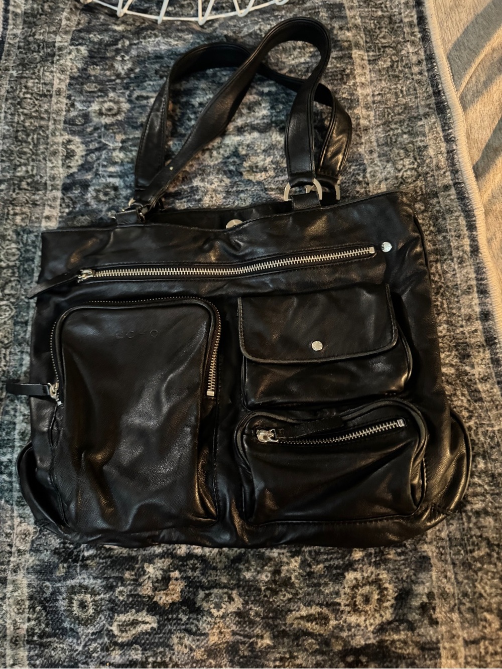 Echo Black Leather Multi-Pocket Messenger Bag